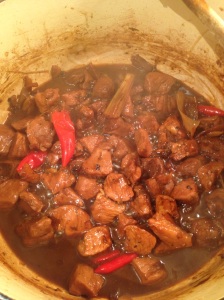 Balinese Pork simmering in chicken stock with 2 types of soy sauce
